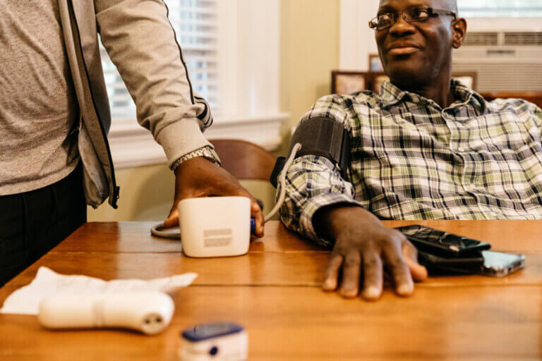 A Joseph's House resident getting his blood pressure checked.